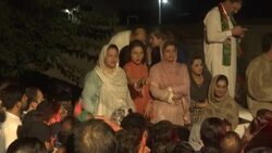 CLEAN : Pakistan: Opposition supporters gather outside Imran Khan's house News Clip