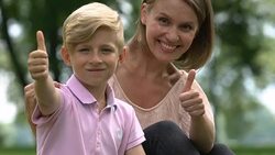 Happy family showing thumbs-up after visiting psychologist, healthy toothy smile Stock Footage