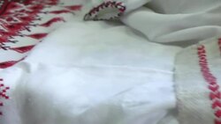 National red and white embroidery. The process of decorating decorative towels embroidered red ornament.  national red and black embroidery thread. Stock Footage