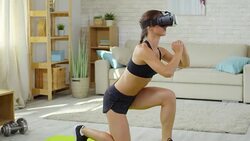 Woman Doing Split Squats at Home Stock Footage
