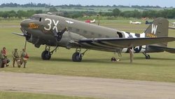 Parachutists boarding Douglas Dakota aircrafts at Imperial War Museum Duxford News Clip