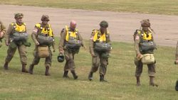 Parachutists boarding Douglas Dakota aircrafts at Imperial War Museum Duxford News Clip
