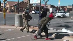 CLEAN : South African army patrols Soweto streets to deter looters News Clip