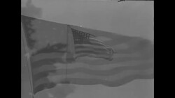 Fourth of July rededication of democracy principles with street scenes; flags; Mt. Rushmore; Iwo Jima flag raising; Crosby sings Old Glory News Clip