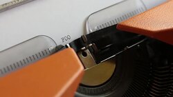 Close up footage of a person writing FOOD CRISIS on an old typewriter, with sound Stock Footage
