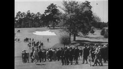 United States, 1950s: Ben Hogan tees off in front of crowd Stock Footage