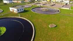Aerial view to sewage treatment plant. Grey water recycling. Waste management theme. Stock Footage