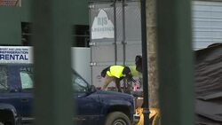 CLEAN : Workers set up refrigerated trailer outside New York hospital News Clip