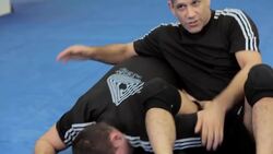 How to Do an Omoplata MMA Submission Instructional Video
