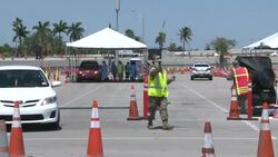CLEAN : People get tested at a drive-thru coronavirus location in Florida News Clip