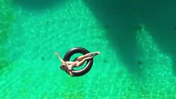 Relaxation in a swimming pool Stock Footage