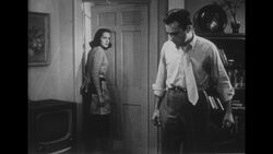 1950s: Wedding ring spins and lands on floor Stock Footage