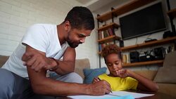 Father spends creative time with his daughter Stock Footage