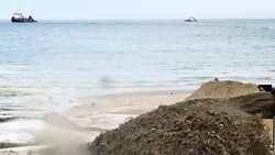 Wide Angle: Sand Flowing onto Beach Stock Footage