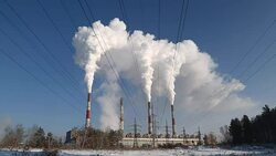 Smoking Chimneys of a Power Plant. Electricity pylons Stock Footage