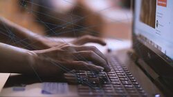 CU : Hand typing on a keyboard laptop with communication network Stock Footage