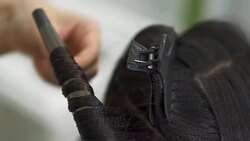 Beautiful girl does a hairstyle in a beauty salon Stock Footage