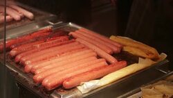 Sausages on plate grill in 4K Stock Footage