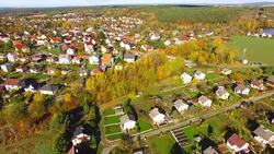 Camera flight over area for pleasant living in suburban district. Urban landscape in Czech Republic, Europe. Stock Footage