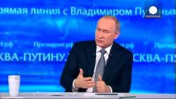 Putin attempts to reassure Russia as economy continues to decline News Clip
