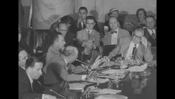 Sen. Joseph McCarthy and US Army lawyer Welch exchange in hearing; Cohn, Adams in room News Clip