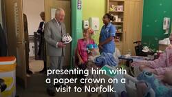 King Charles presented with paper crown by young girl at new hospice opening Instructional Video