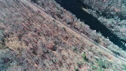 Aerial view of Pocono Mountains, Appalachian, in late fall sunny day. The Hickory River Stock Footage