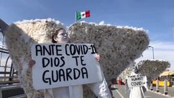 CLEAN : Evangelical group dress up as white angels on Mexico/US border News Clip