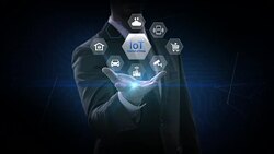 Businessman opens palm, IoT hexagon icon, Home security, cctv, smart city, mobile app, car, internet of thing. 4K movie. Stock Footage