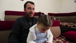 Syria father trains daughter to laugh at bombs News Clip