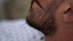 Barber Cutting Beard Stock Footage