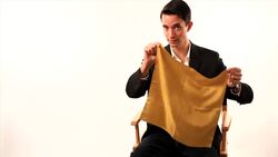 How to Produce a Half Dollar from Napkin Using Magic Instructional Video