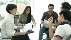 Business people sit around and meeting team together. Businessman and businesswoman sharing ideas together, middle east or transcontinental region centered on western asia. Stock Footage