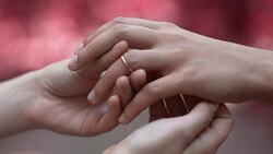 Lesbians wearing rings on ceremony, wedding of same-sex love partners, close-up Stock Footage