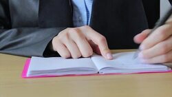 Left handed person writing Stock Footage