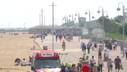 UK Heatwave - People on the beach at Skegness News Clip