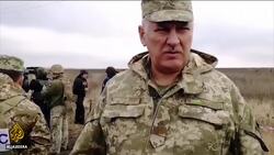 Ukraine troops, separatists withdraw amid hopes for peace News Clip