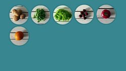 Different kind of vegetables and fruits appearing on the blue background Stock Footage