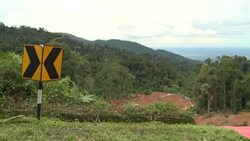 CLEAN : Malaysia: Police officer comments on situation after landslide News Clip