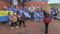 Ukrainian & Scottish fans singing in a choir outside Hampden Park News Clip