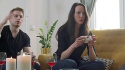 Young friend playing video game Stock Footage