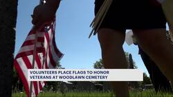 Showing respect: Volunteers prepare Woodlawn Cemetery for Memorial Day News Clip