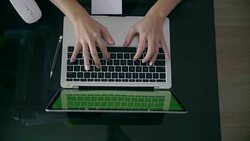 Top view of woman hands using laptop with green screen Stock Footage