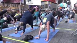 CLEAN : Yogis celebrate Summer Solstice at New York's Times Square News Clip