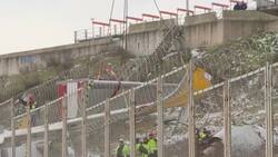 Crane lifts parts of Turkey crash plane from site Instructional Video