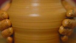 Potter makes a jug Stock Footage