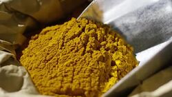 Super slow motion macro of cumin powder dosage Stock Footage