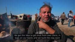 Displaced Palestinian bakes bread with improvised clay ovens for those in need News Clip