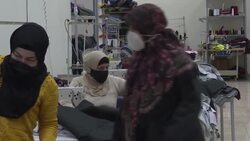 CLEAN : Lebanese seamstresses stitch Covid-19 body bags as deaths spike News Clip