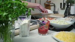 Young woman preparing pizza Stock Footage